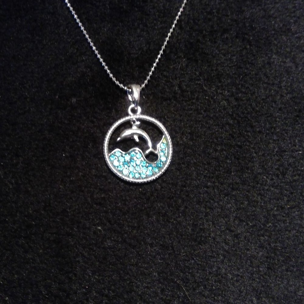 Turquoise rhinestone dolphin pendant